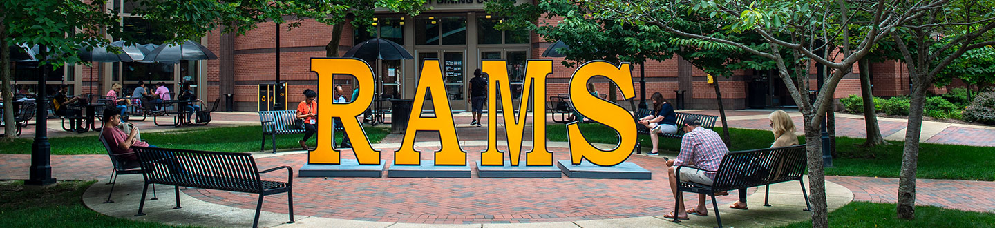 sign spelling RAMS in gold letters